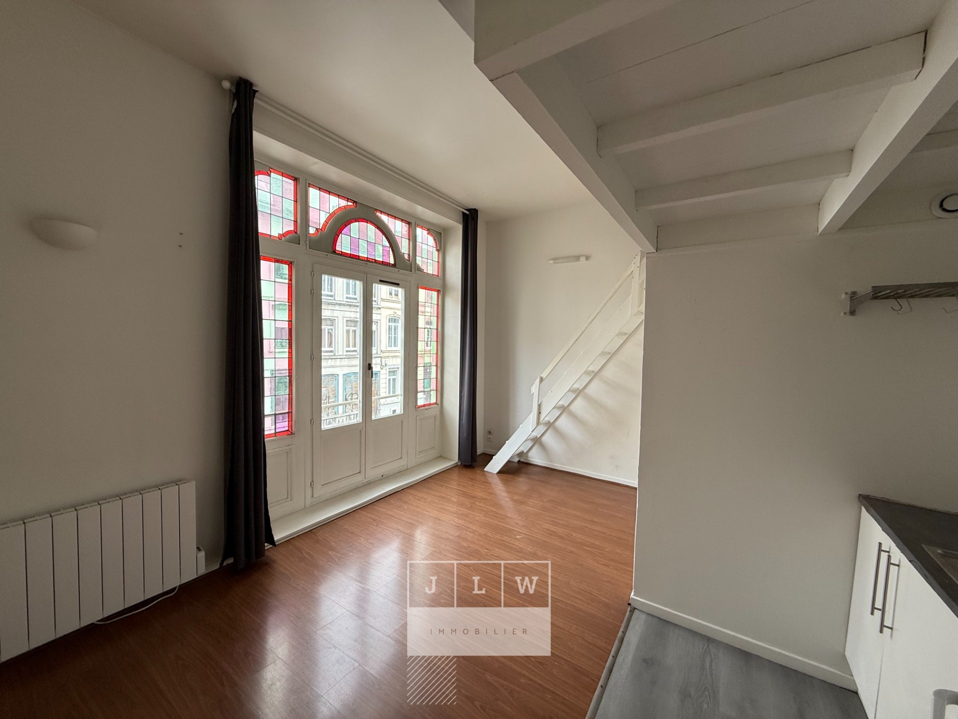 Lille st michel studio avec mezzanine Photo 1 - JLW Immobilier Lille st michel studio avec mezzanine Photo 1 - JLW Immobilier