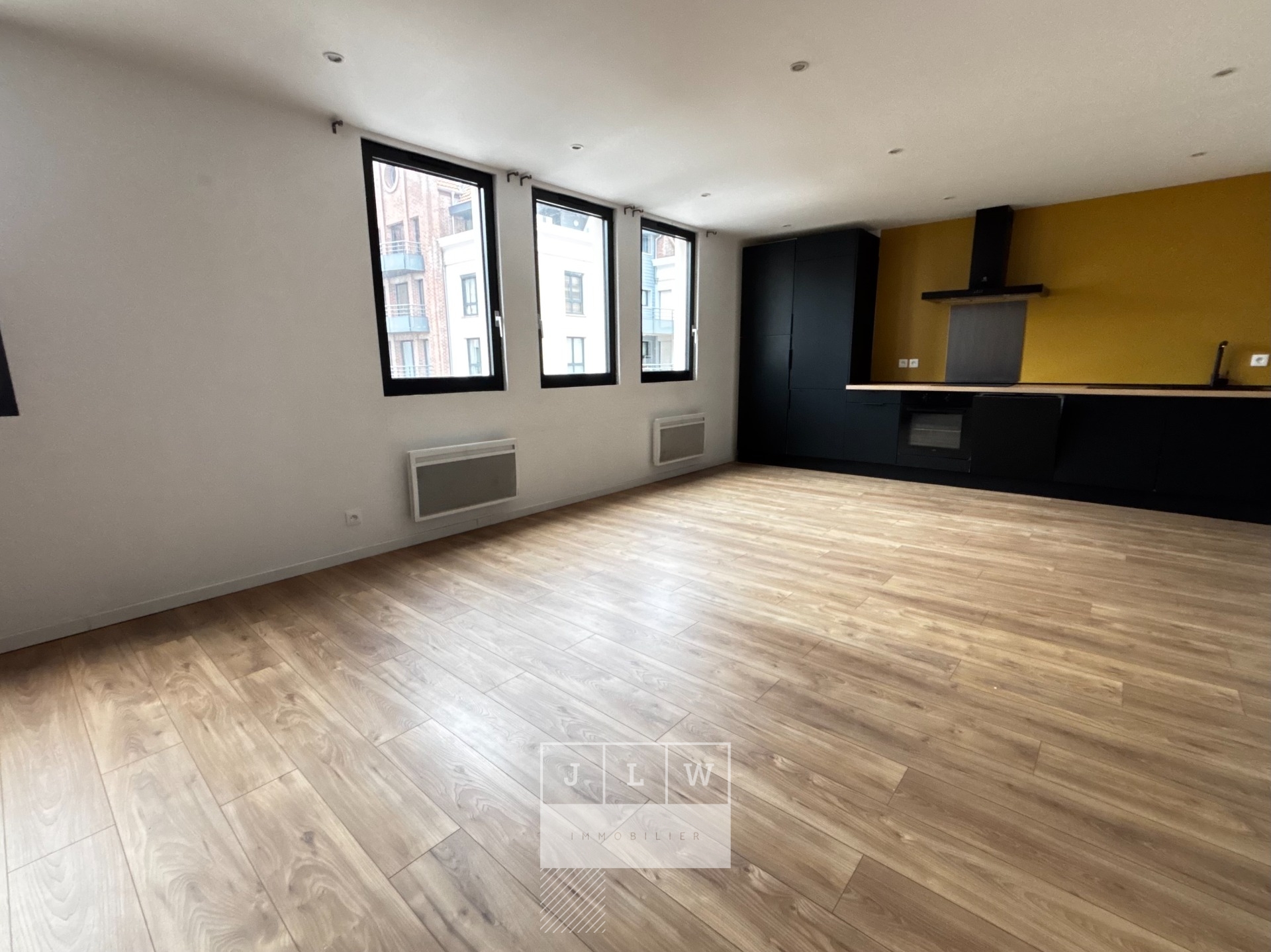Vieux lille appartement de type 3 avec parking et cave Photo 1 - JLW Immobilier