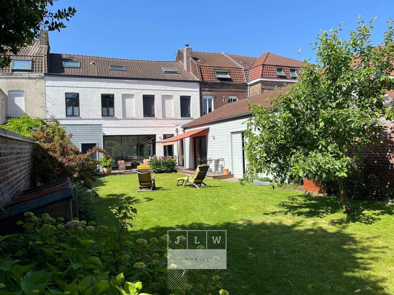 Belle maison familiale au coeur du bourg de marcq en baroeul Photo 1 - JLW Immobilier Belle maison familiale au coeur du bourg de marcq en baroeul Photo 1 - JLW Immobilier