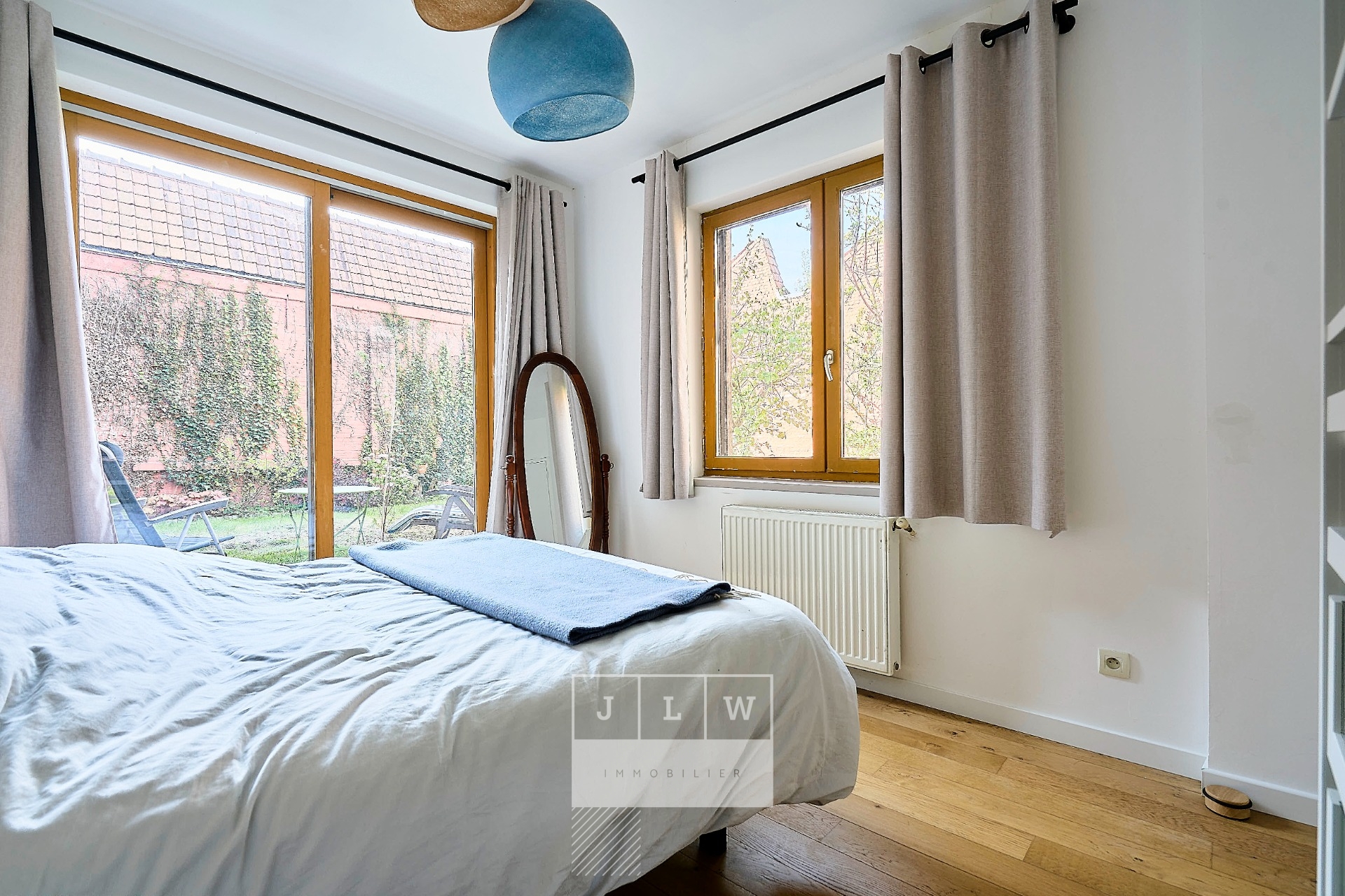 Superbe appartement avec jardin et garage Photo 5 - JLW Immobilier