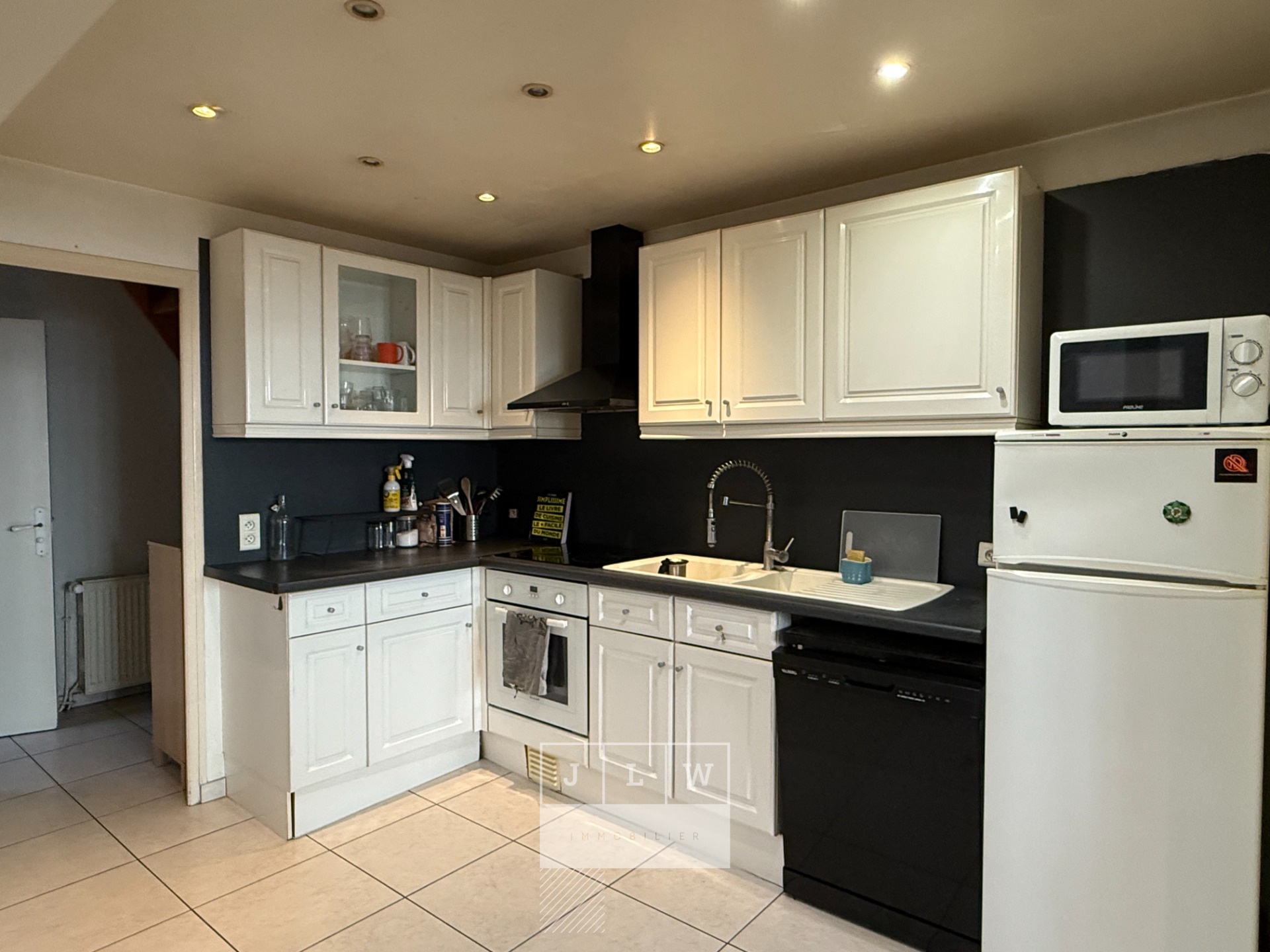 Iuq ll152 pro a les cles rue gantois t3 meuble Photo 2 - JLW Immobilier Iuq ll152 pro a les cles rue gantois t3 meuble Photo 2 - JLW Immobilier